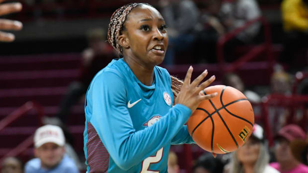 Razorbacks Samara Spencer drives into the lane against UCA on Monday night